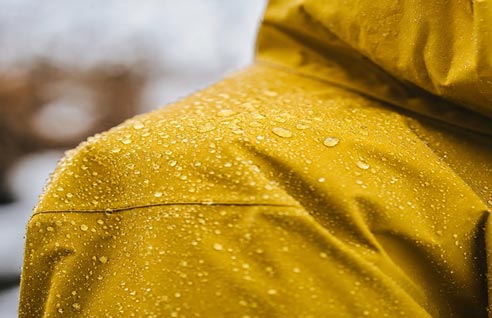 Water-repellent fire protective fabric with water droplets